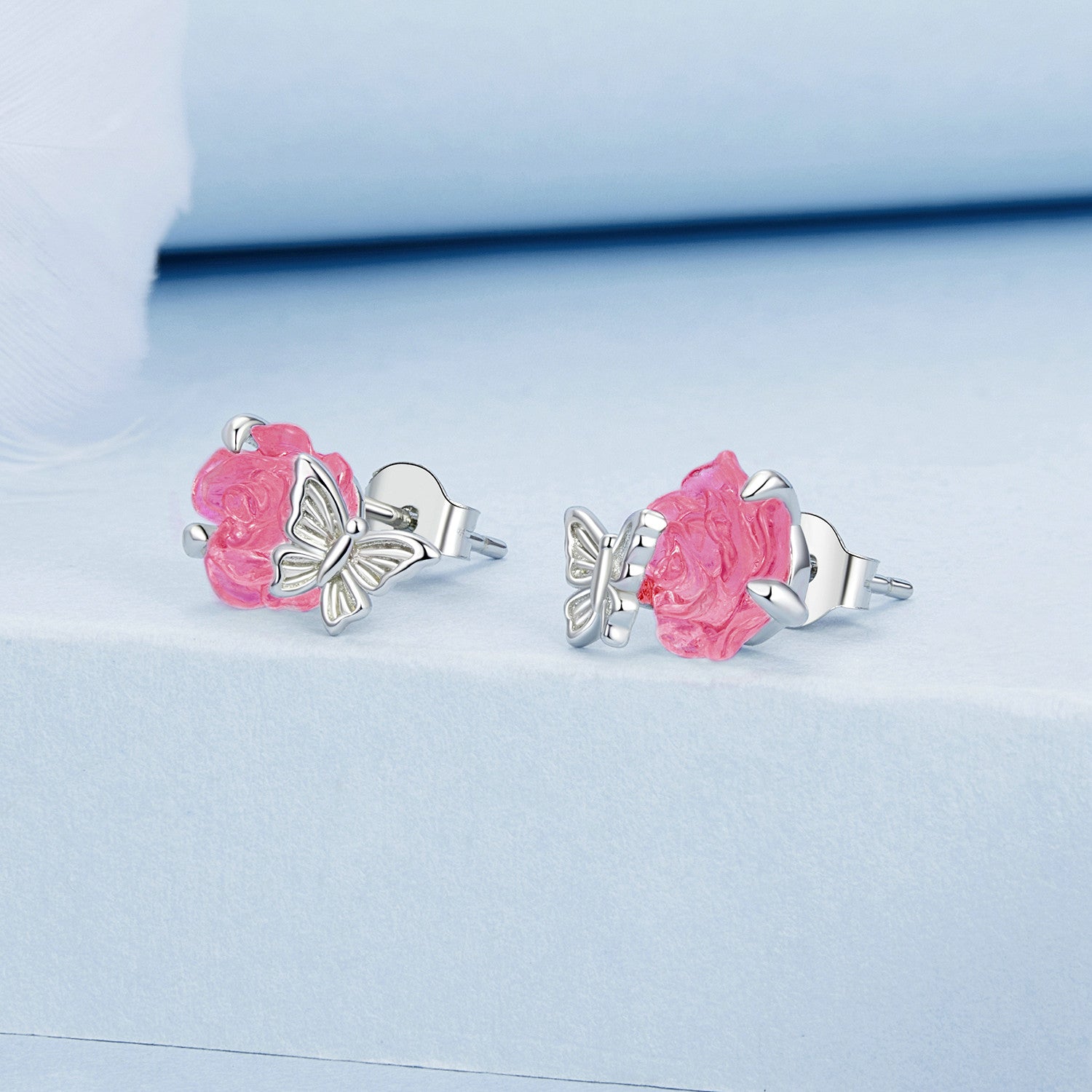 "Sylvory 925 Sterling Silver Rose UV Magic Studs"
