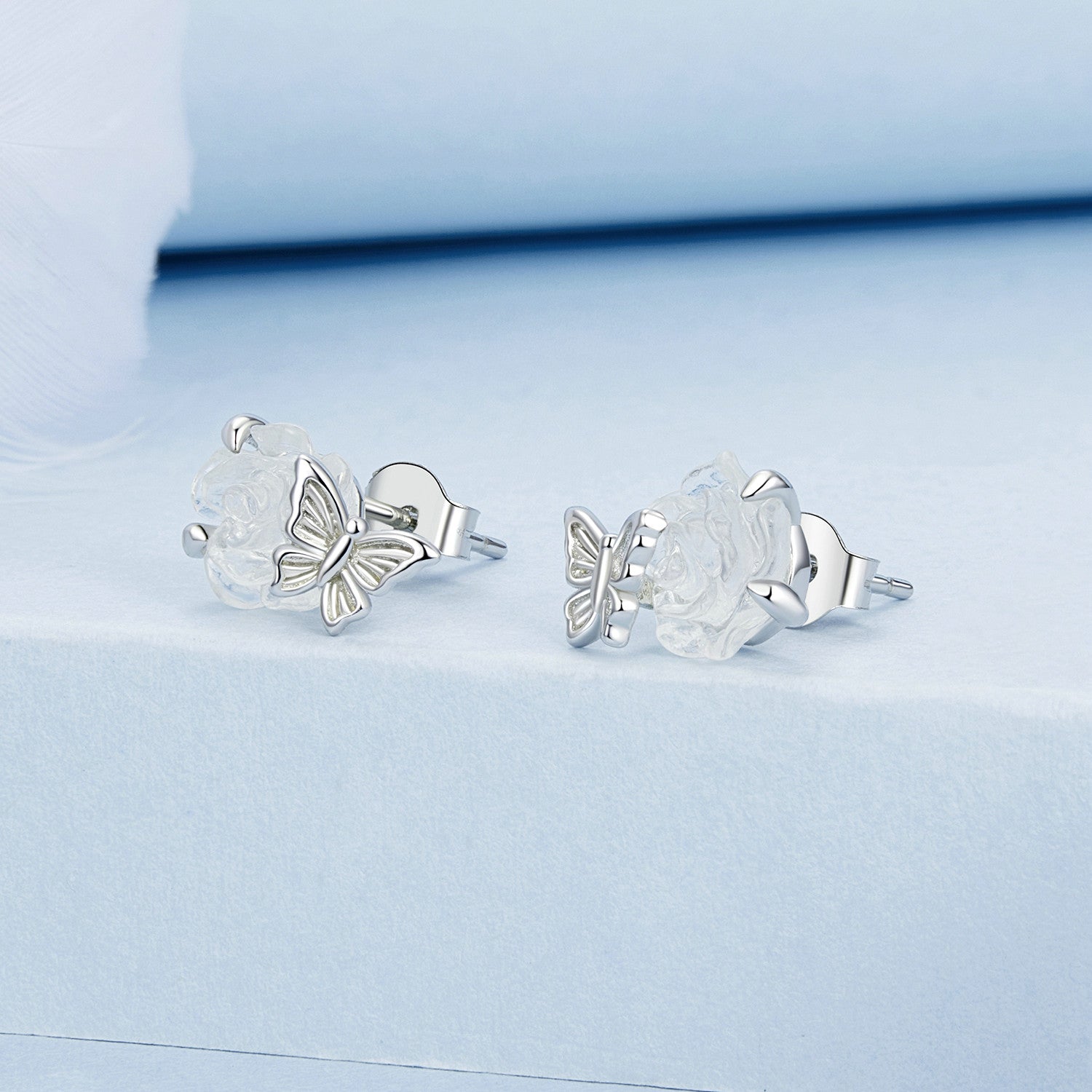 "Sylvory 925 Sterling Silver Rose UV Magic Studs"